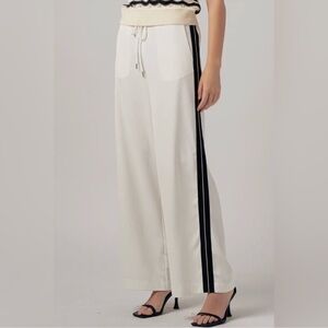 Side striped relaxed wide leg statement pants in Ivory. New